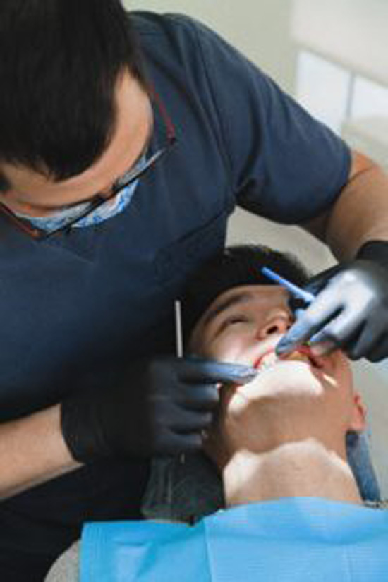 Dentist working on a patient