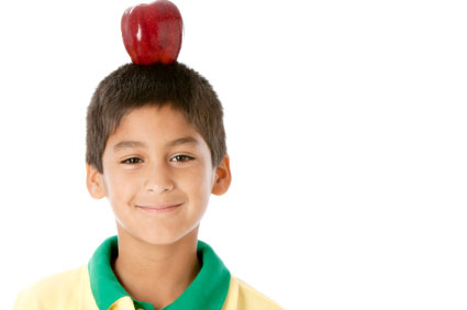 Boy with an apple on his head